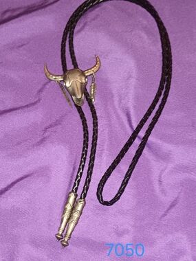 Western Bull Skull Bolo Tie in Black and Brass